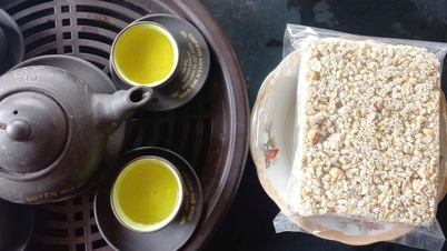 ຮັກສາບັນຍາກາດເທດສະການເຕັດແບບດັ້ງເດີມ: ກິ່ນຫອມອັນອຸດົມສົມບູນຂອງເຂົ້າໜຽວຈາກຊຸດ "ສອງໂຖ".