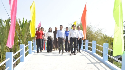 ชุมชน Giồng Riềng เปิดตัวสะพานคลอง Hội dong