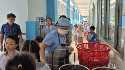 Students vomit and have stomach aches; parents suspect it's due to school lunch; school holds emergency meeting.