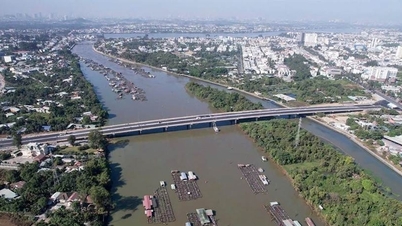 Dong Nai province commences construction of a 574 billion VND riverside road along the Cai River and opens the Thong Nhat Bridge to traffic.