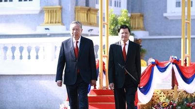 Upacara penyambutan meriah untuk Sekretaris Jenderal To Lam di Vientiane, Laos.