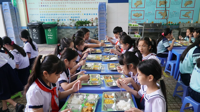 The contrasting scenes after the scandal involving allegedly tainted meat being supplied to numerous schools in Ho Chi Minh City.