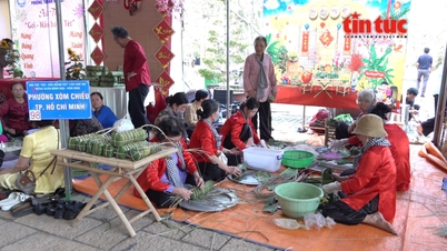 Ho-Chi-Minh-Stadt: Fast 100 Teams wetteifern darum, Tet-Kuchen zu verpacken, die dem Nationalahnen dargebracht werden sollen.