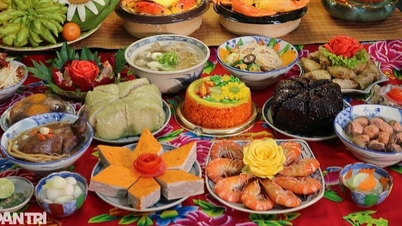 Como o costume de cultuar o Deus da Cozinha na China difere do costume no Vietnã?