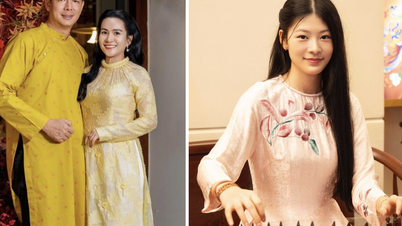 Binh Minh's two daughters attracted attention when they dressed up in traditional Vietnamese ao dai dresses alongside their mother.