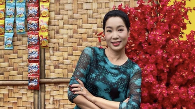 Trinh Kim Chi created a spring-themed miniature landscape and invited her neighbors to come and take photos.