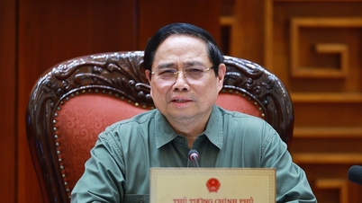 នាយករដ្ឋមន្ត្រី ផាម មិញឈីញ៖ ការសាងសង់ស្ពានថ្មីមួយឆ្លងកាត់ទន្លេឡូ បានបើកឱកាសថ្មី និងបំពេញតម្រូវការអភិវឌ្ឍន៍ថ្មីៗ។