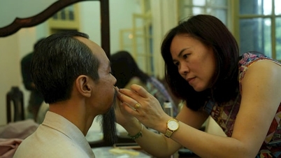 De kunstenares maakt al meer dan 20 jaar portretten van president Ho Chi Minh.