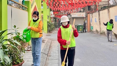 Frontlinjetjänstemän "går från gata till gata och knackar på varje dörr" för ett civiliserat och modernt Hanoi.