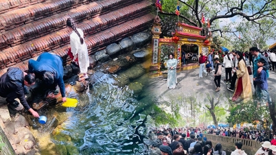 No quinto dia do Ano Novo Lunar, moradores e turistas se reúnem no Poço de Ngoc, em Bac Ninh, para orar pela paz e prosperidade.
