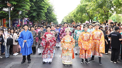 Den 12:e Ao Dai-festivalen i Ho Chi Minh City har temat "Odödlighetens gyllene trådar - Vävning av strävanden".