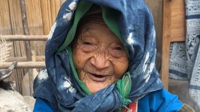 O femeie în vârstă de 97 de ani din Vietnam a devenit faimoasă în întreaga lume după un simplu salut adresat unui turist occidental.