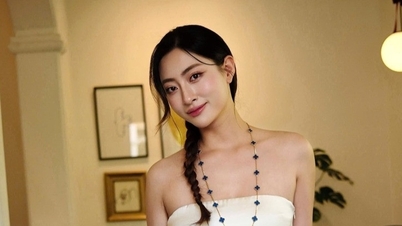 La señorita Luong Thuy Linh luce sus sensuales hombros descubiertos, mientras que Siu Black baila enérgicamente tras tres meses de diálisis.