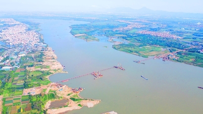 Progresso da Ponte Thuong Cat após 5 meses e obstáculos na conexão com o Boulevard Panorâmico.