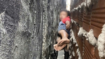 হো চি মিন সিটিতে দুটি দেয়ালের মাঝে আটকে পড়া এক বালককে উদ্ধার।