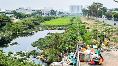 Kekurangan pasir dan asfalt mengancam kemajuan projek terusan Tham Luong - Ben Cat.