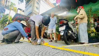 Clearing sidewalk encroachments: Progress in central Da Nang, while the outskirts remain stagnant.