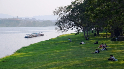 Hue, with its lush green banks along the Perfume River.