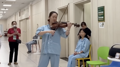 'Special' patient playing viola in hospital hallway attracts millions of views.