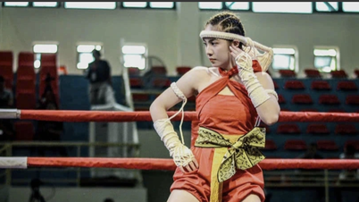 A 12th-grade female student wins a series of international martial arts medals.
