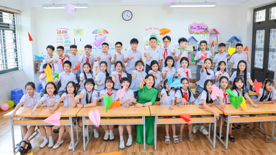 Graduating students excitedly take yearbook photos.