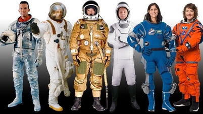 Why did astronaut Artemis II wear an orange suit instead of white like Apollo?