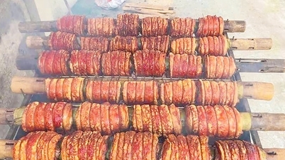 डंडे पर भुना हुआ सूअर का मांस - Đoài क्षेत्र का लाजवाब स्वाद।