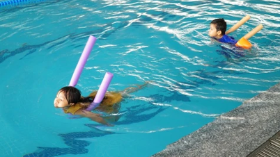 Developing school swimming: Enhancing physical fitness and protecting children.