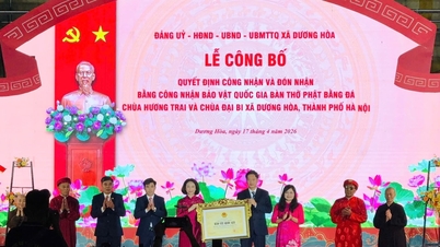 Duong Hoa beldesinde, iki adet taş Budist sunağı için Ulusal Hazine tanınma belgesinin teslim alınması töreni düzenlendi.