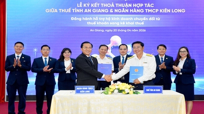 El Departamento de Impuestos de la provincia de An Giang y KienlongBank firman un acuerdo de cooperación para apoyar a las familias empresarias.