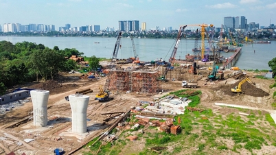 Die ersten Pfeiler der fast 16 Billionen VND teuren Brücke haben Gestalt angenommen.