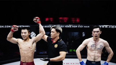 Campeonato del León 31: El luchador vietnamita Ban Van Hoang "combate" contra un luchador chino.