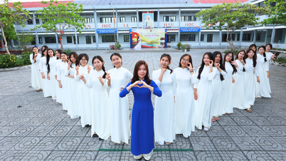 ពិធីប្រគល់អាវផាយពណ៌ស (សម្លៀកបំពាក់ប្រពៃណីវៀតណាម) ដល់សិស្សស្រី និងគ្រូបង្រៀននៅកោះកុងដាវ។