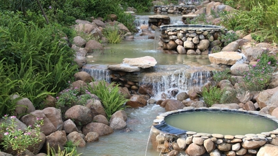 Een waterval met negen niveaus is ingehuldigd op de historische locatie Kim Lien.