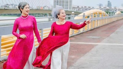 Kvinnor med "gnistrande silverhår" kommer att paradera i traditionella ao dai-klänningar genom Da Nangs gator.