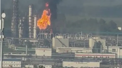 Ukrainian drones attack a major Russian oil refinery for the second time in three days, engulfing it in flames.
