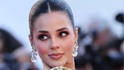 Miss Grand International trägt ein durchsichtiges Outfit auf dem roten Teppich in Cannes.