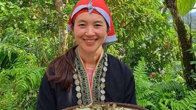 ស្ត្រី​ជនជាតិ​តាវ​ក្រហម​ម្នាក់​បាន​ទាក់ទាញ​ចំណាប់អារម្មណ៍​អ្នក​ប្រើប្រាស់​អ៊ីនធឺណិត​ជាមួយនឹង​សម្រស់​ខ្ពង់រាប​របស់​នាង។