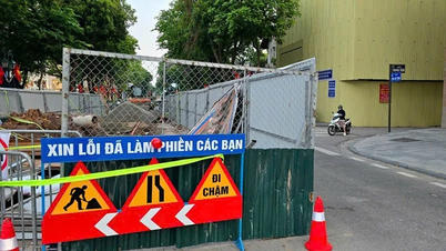 Hanoï : Déviation et régulation de la circulation rue Quang Trung en raison de la construction d'un système de drainage.
