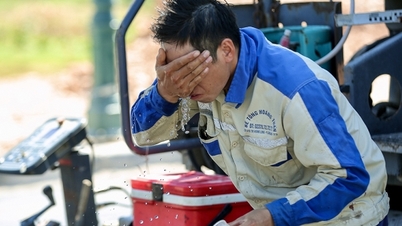 I lavoratori di Thanh Hoa lottano contro il caldo estremo.