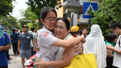 Images show students beaming with joy and bursting into tears in their mothers' arms after the 10th grade Literature exam in Hanoi.