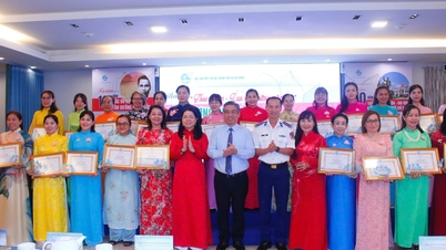 Ho Tši Minhin kaupungin naisliitto palkitsi 166 "kukka" presidentti Ho Tši Minhin opetusten tutkimisesta ja noudattamisesta.