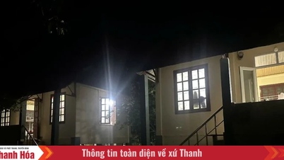 Lights illuminate the Muong Lat student village before the high school graduation exam.