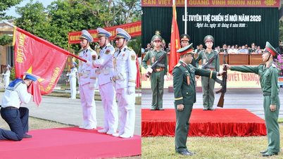 Chiến sĩ mới nhận vũ khí và tuyên thệ dưới Quân kỳ Quyết thắng