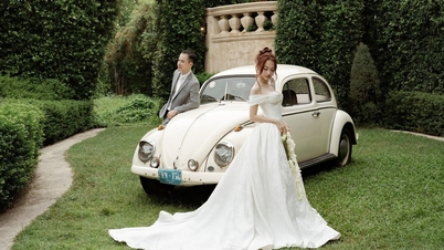 Xuan Nghiさんとエンジニアの恋人とのロマンチックな結婚写真。