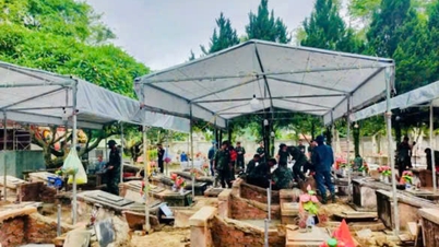نمونه‌برداری در گورستان شهدای توآن گیائو برای شناسایی سربازان کشته‌شده با استفاده از آزمایش DNA در حال انجام است.