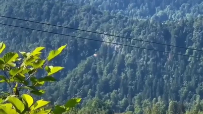 Saksikan rakyat Ukraine melintasi sempadan negara dengan paragliding.