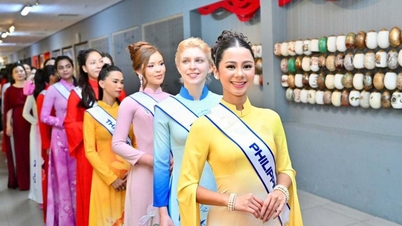 បេក្ខនារីនៃកម្មវិធី Miss Multicultural World 2026 ស្លៀករ៉ូបអាវផាយប្រពៃណីវៀតណាម និងសិក្សាអំពីវប្បធម៌វៀតណាម។
