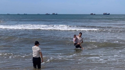 The mother was breathless with worry as her son rushed into the sea to save two young children.