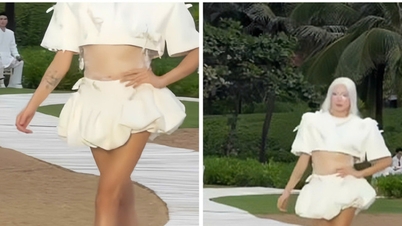 La supermodelo Vo Hoang Yen causó sensación con su forma de manejar un percance con un zapato de tacón alto durante el desfile "Serenade of Summer".